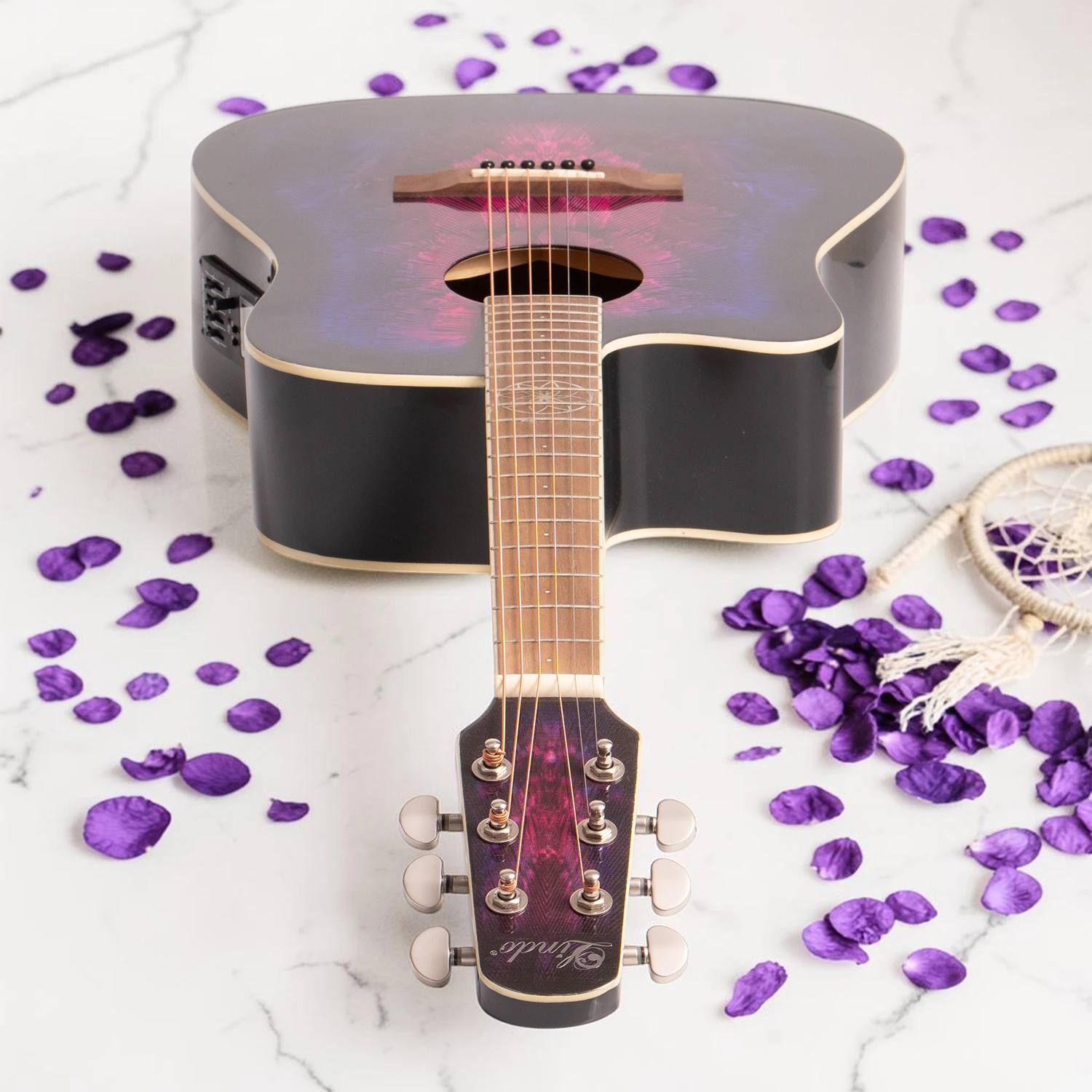 Lindo-swallow-electro-acoustic-guitar-headstock-down-on-floor