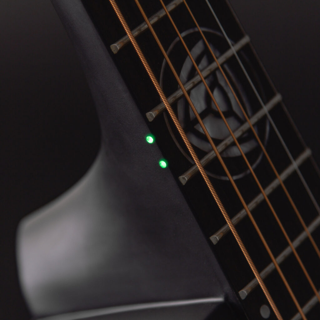Glowing Luminlay side markers on the Neptune guitar