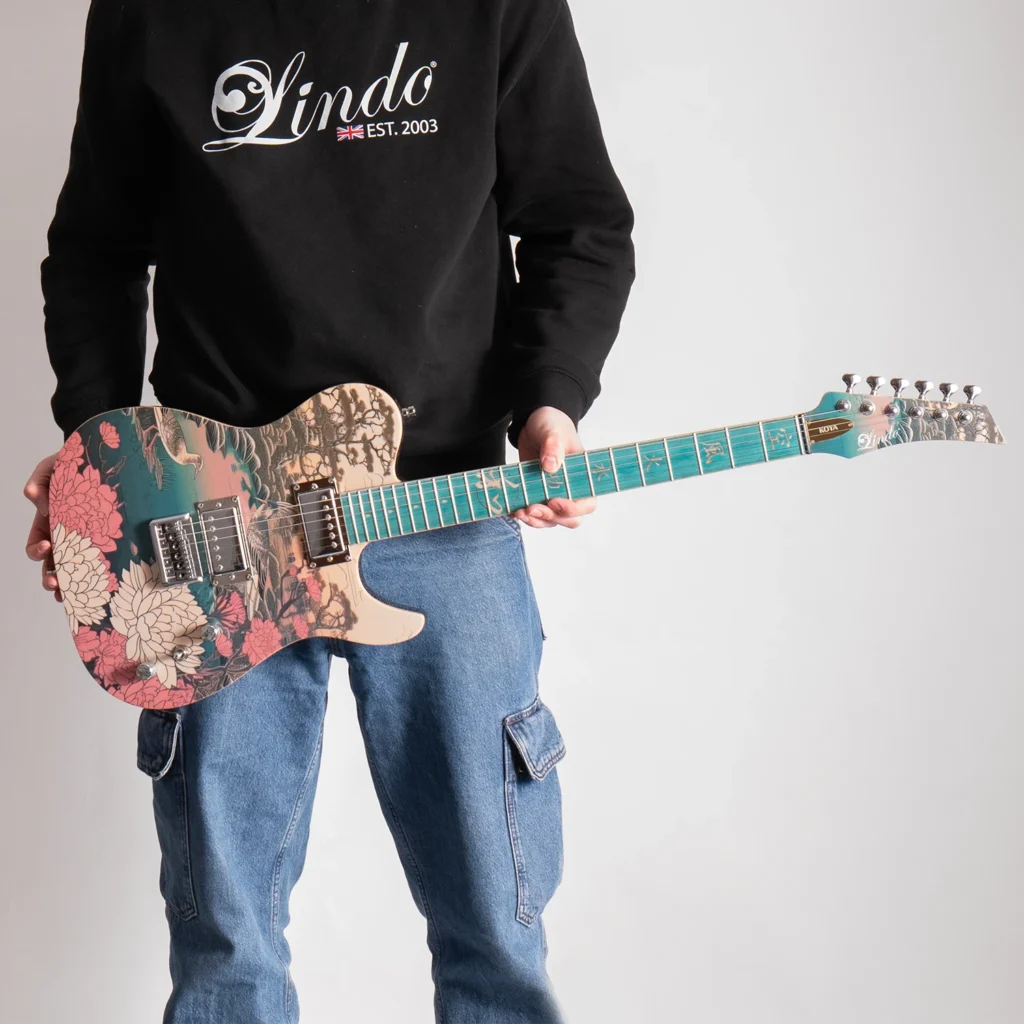 Lindo Koya V2 electric guitar being held