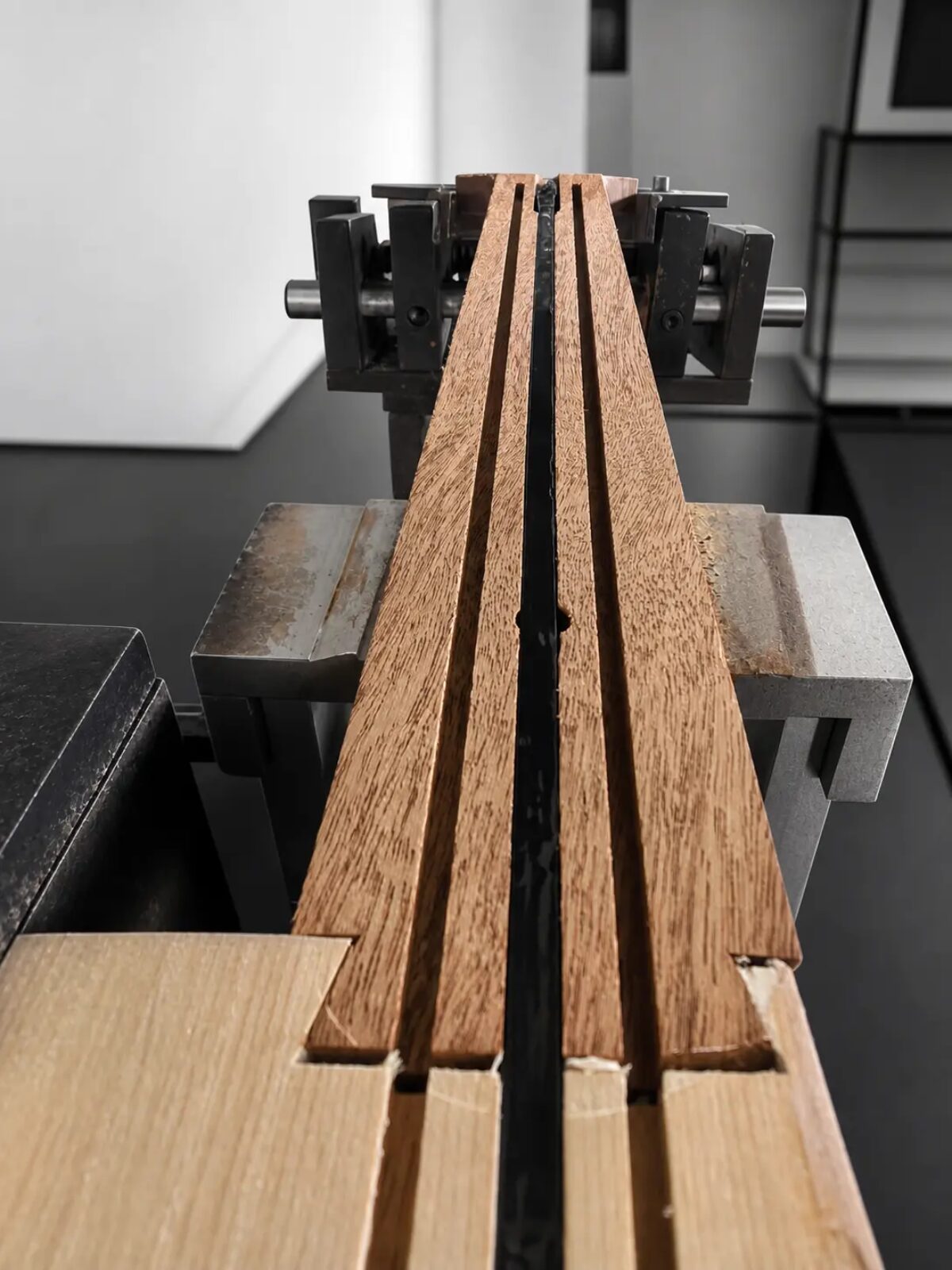 Traditional adjustable steel truss rod inside a Lindo White Dove guitar neck