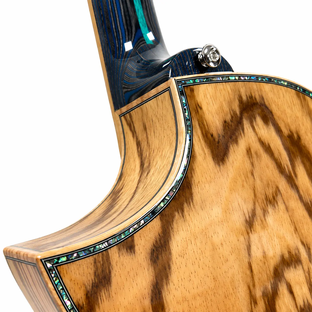 Maple binding and abalone purfling around the zebrano back beside the neck heel