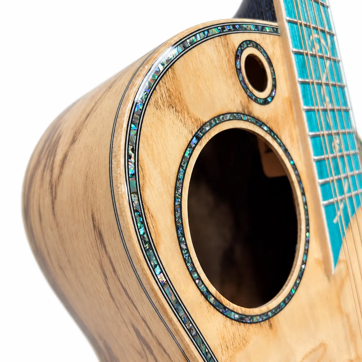 Abalone purfling around the Earth and Moon soundholes and front body edge