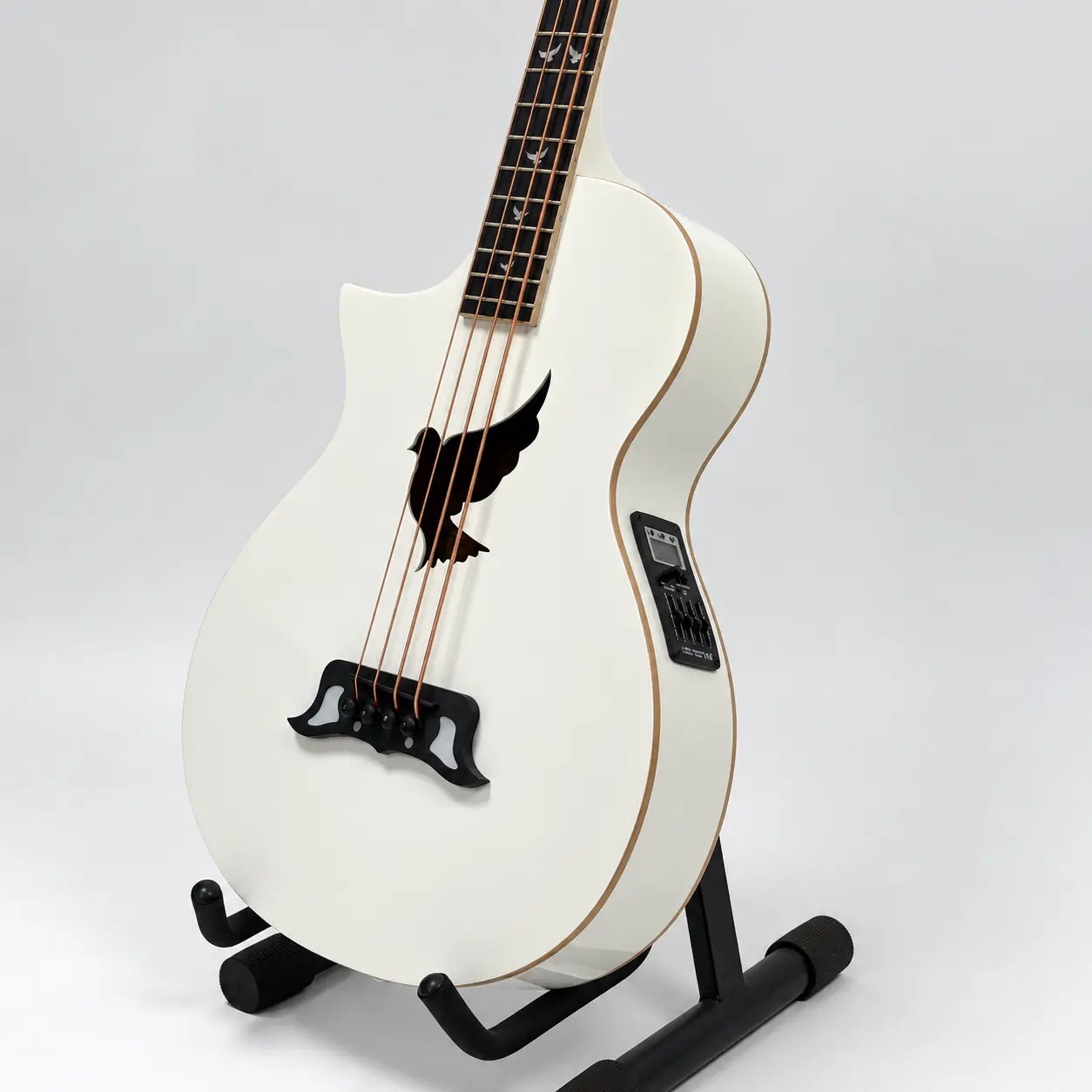 Lindo left-handed White Dove short scale electro acoustic bass guitar — front angled view - preamp side