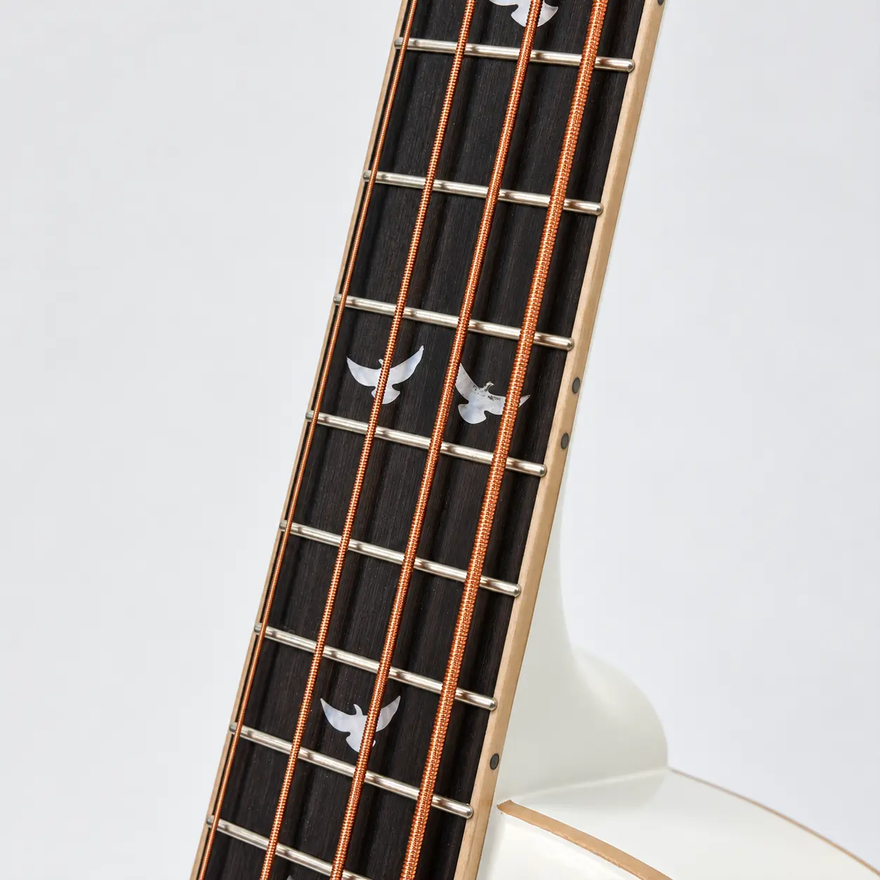 Lindo left-handed White Dove short scale electro acoustic bass guitar — fretboard and bird inlays